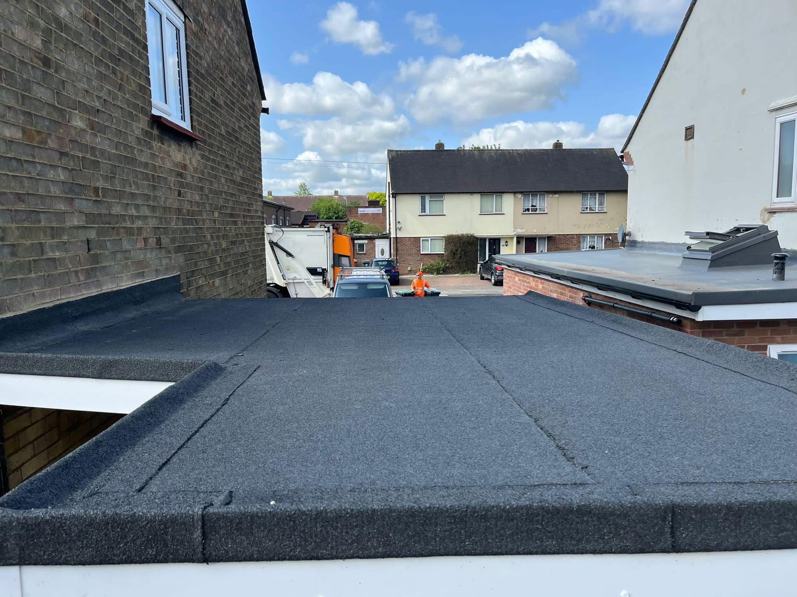 Completed flat roof with new felt covering, watertight